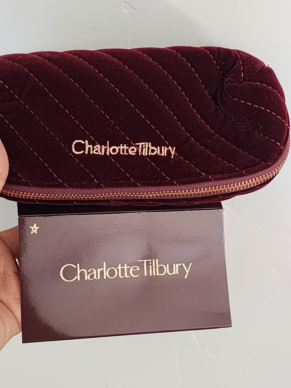 Charlotte Tilbury Quilted Velvet Cosmetic Case in Deep Burgundy with Gold Trim